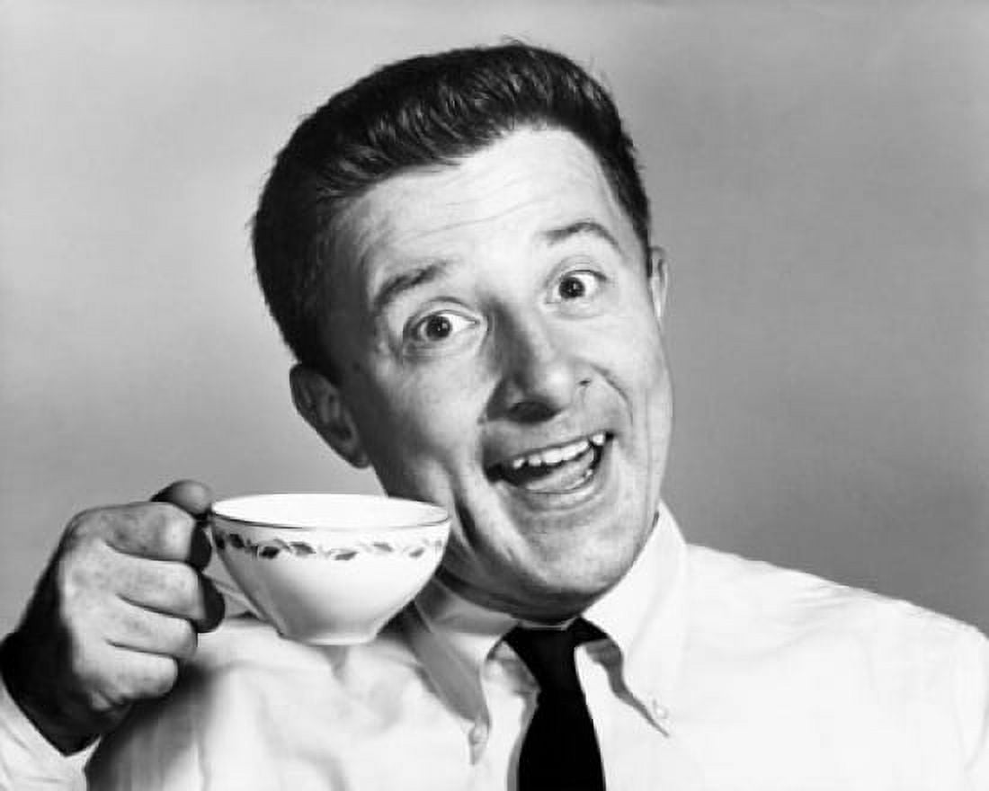 Portrait of a mature man holding a tea cup Canvas Art - (24 x 36)