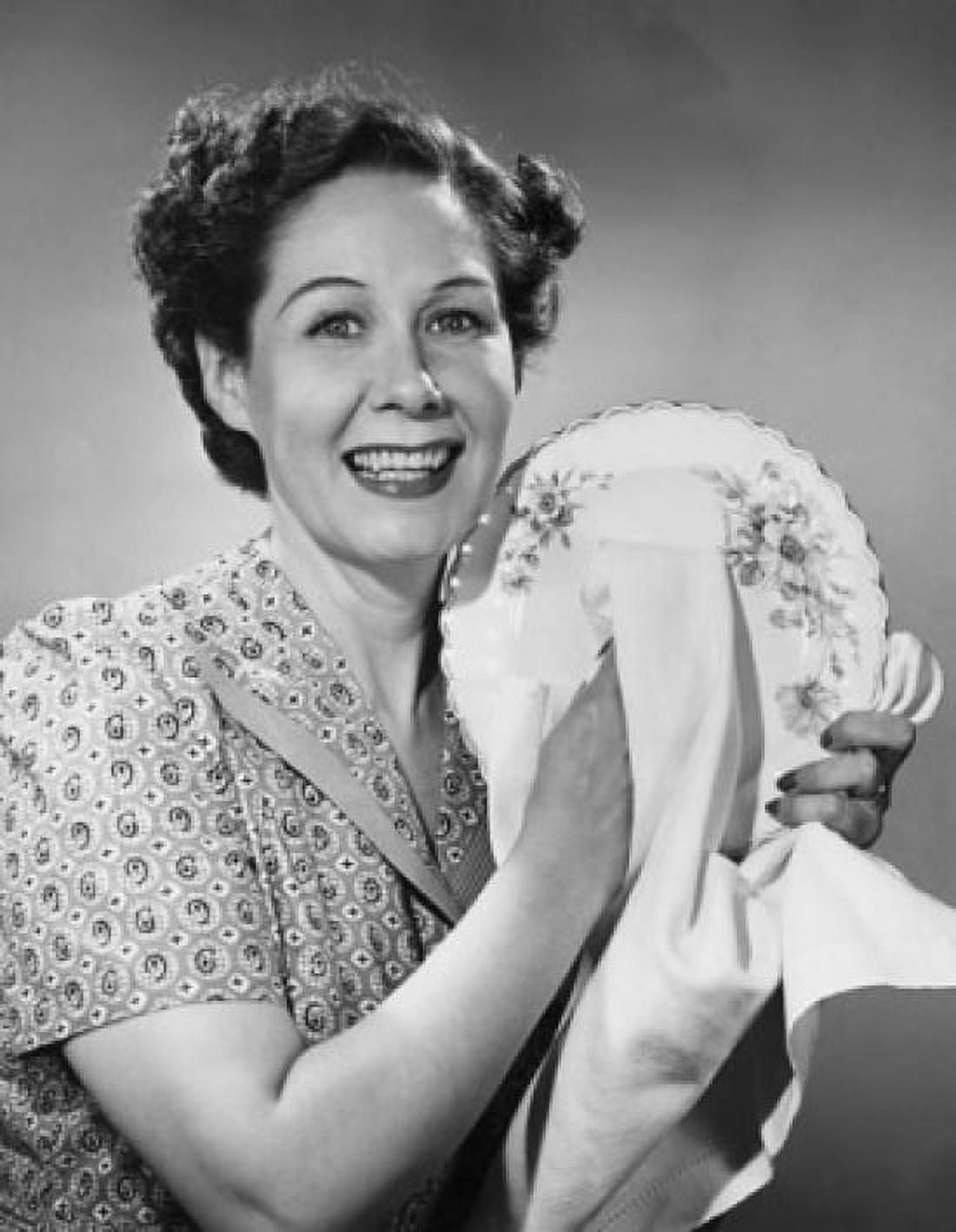 Portrait of a mature woman drying a plate Canvas Art - (24 x 36)
