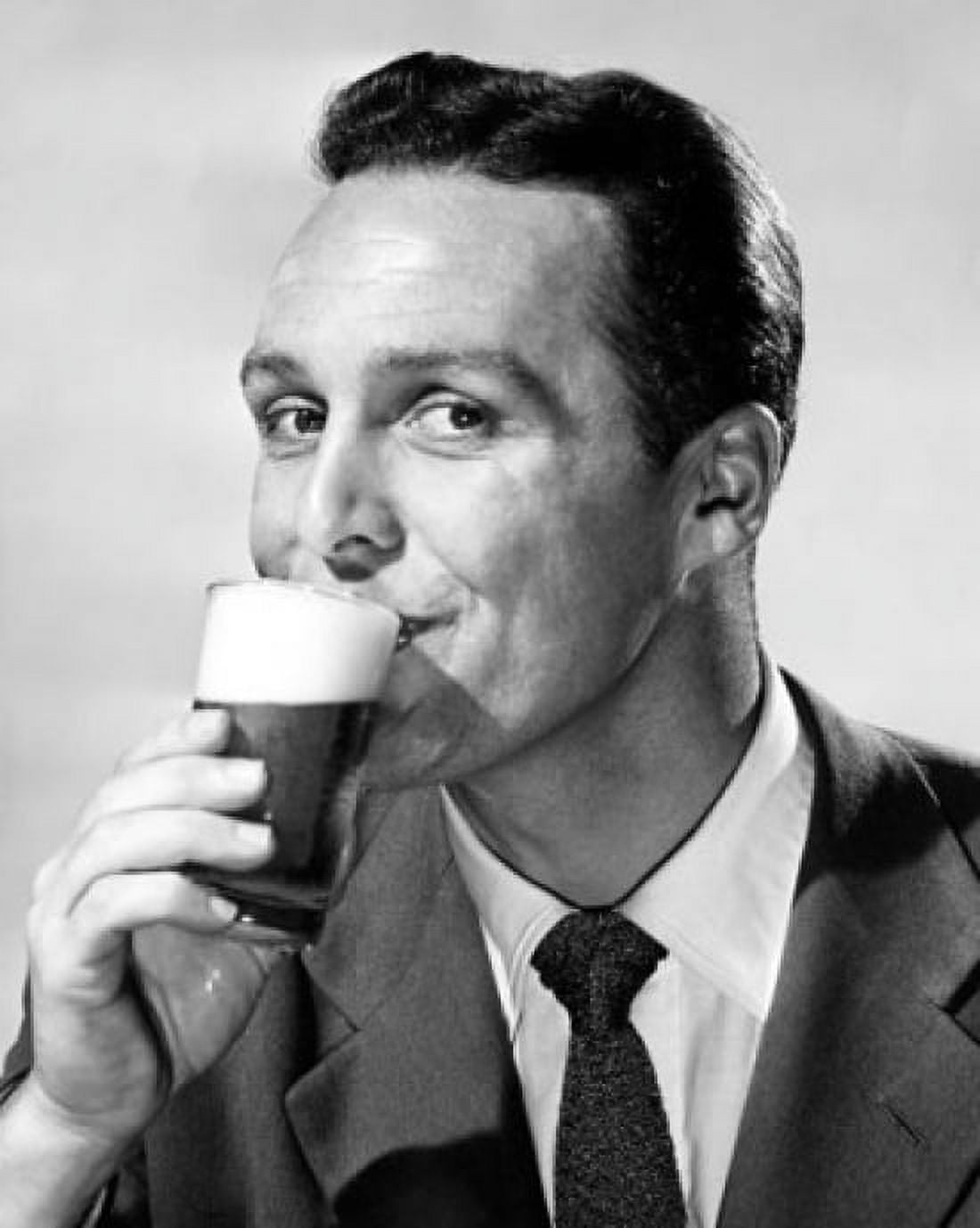 Portrait of a mid adult man drinking beer Canvas Art - (24 x 36)