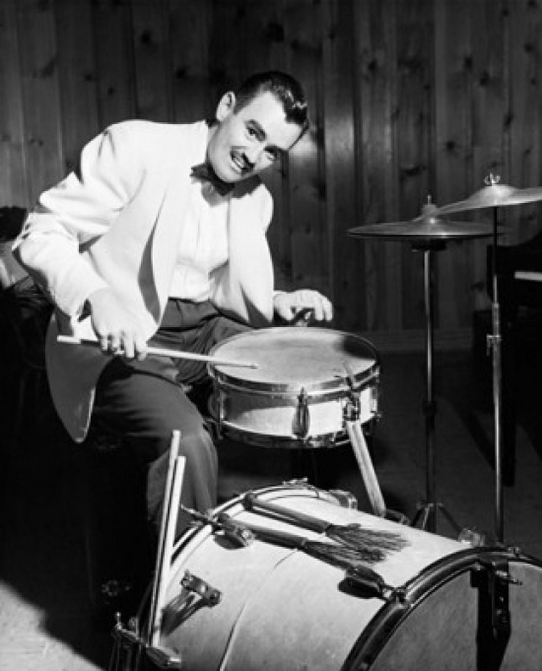 Portrait of a mid adult man playing drums Canvas Art - (24 x 36)