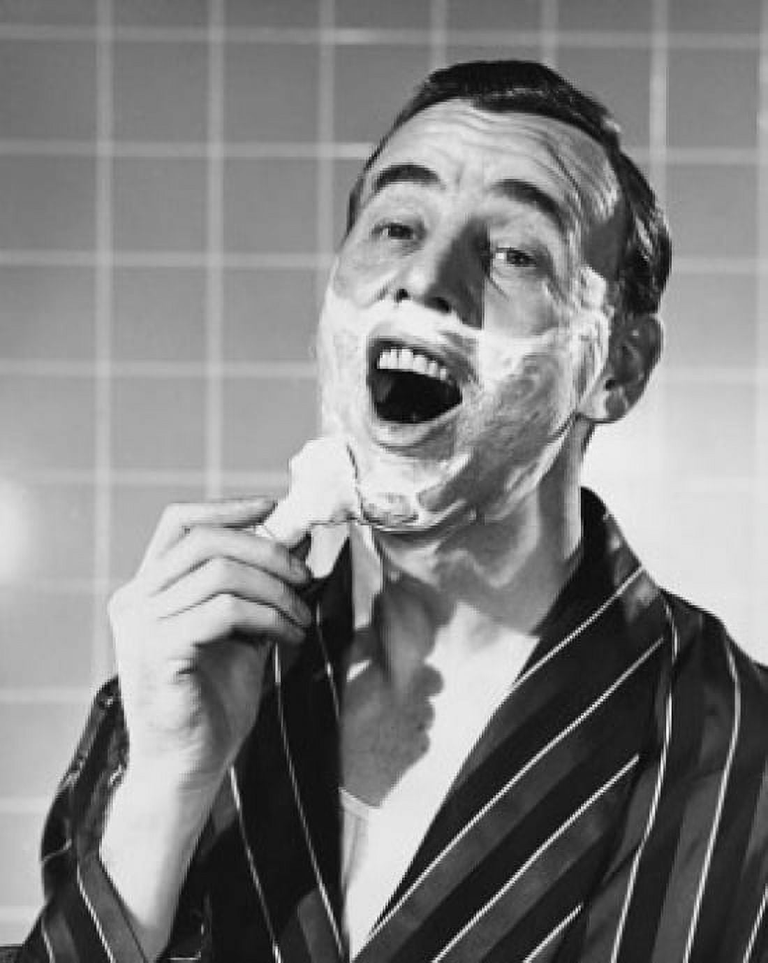 Portrait of a mid adult man shaving Canvas Art - (24 x 36)