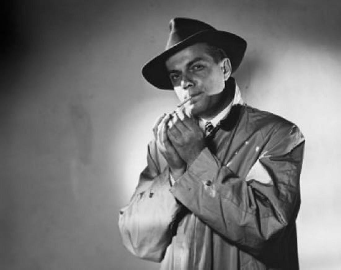 Portrait of a mid adult man smoking a cigarette Canvas Art - (18 x 24)