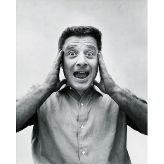 Portrait of a mid adult man suffering from a headache Poster Print (18 x 24)