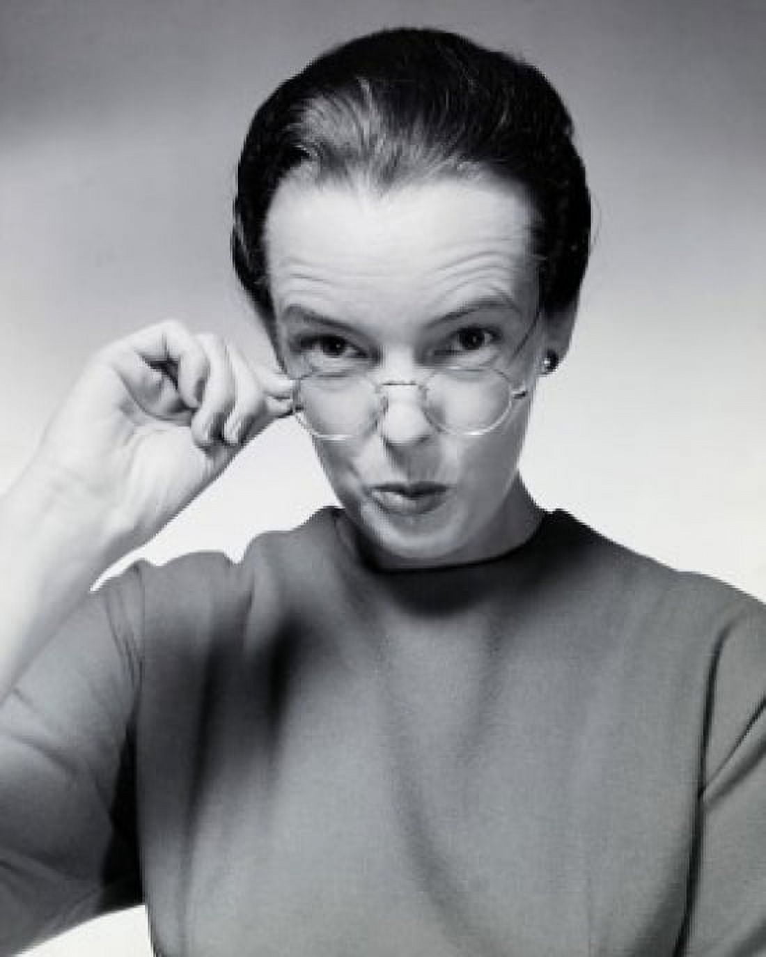 Portrait of a mid adult woman adjusting her eyeglasses Canvas Art - (24 x 36)