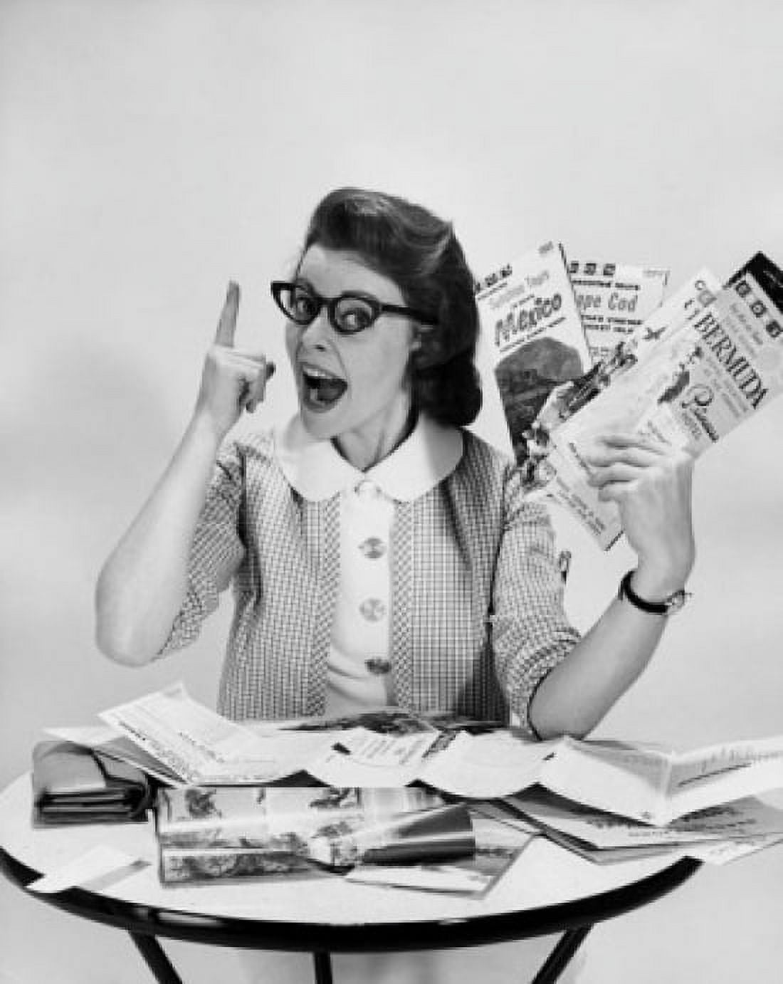 Portrait of a mid adult woman holding brochures Canvas Art - (24 x 36)