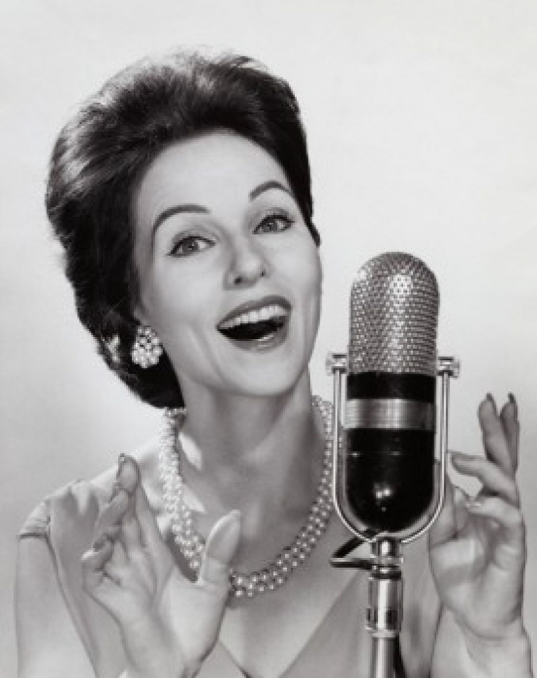 Portrait of a mid adult woman in front of a microphone Canvas Art - (18 x 24)