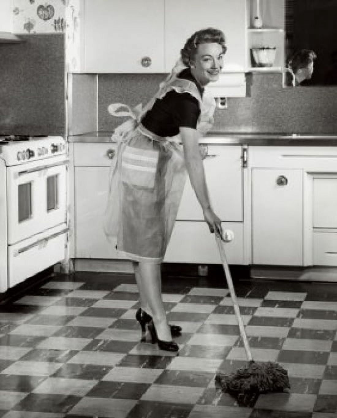 Portrait of a mid adult woman mopping the kitchen floor Canvas Art - (18 x 24)