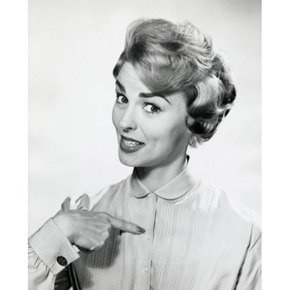 Portrait of a mid adult woman pointing at herself Poster Print (24 x 36)
