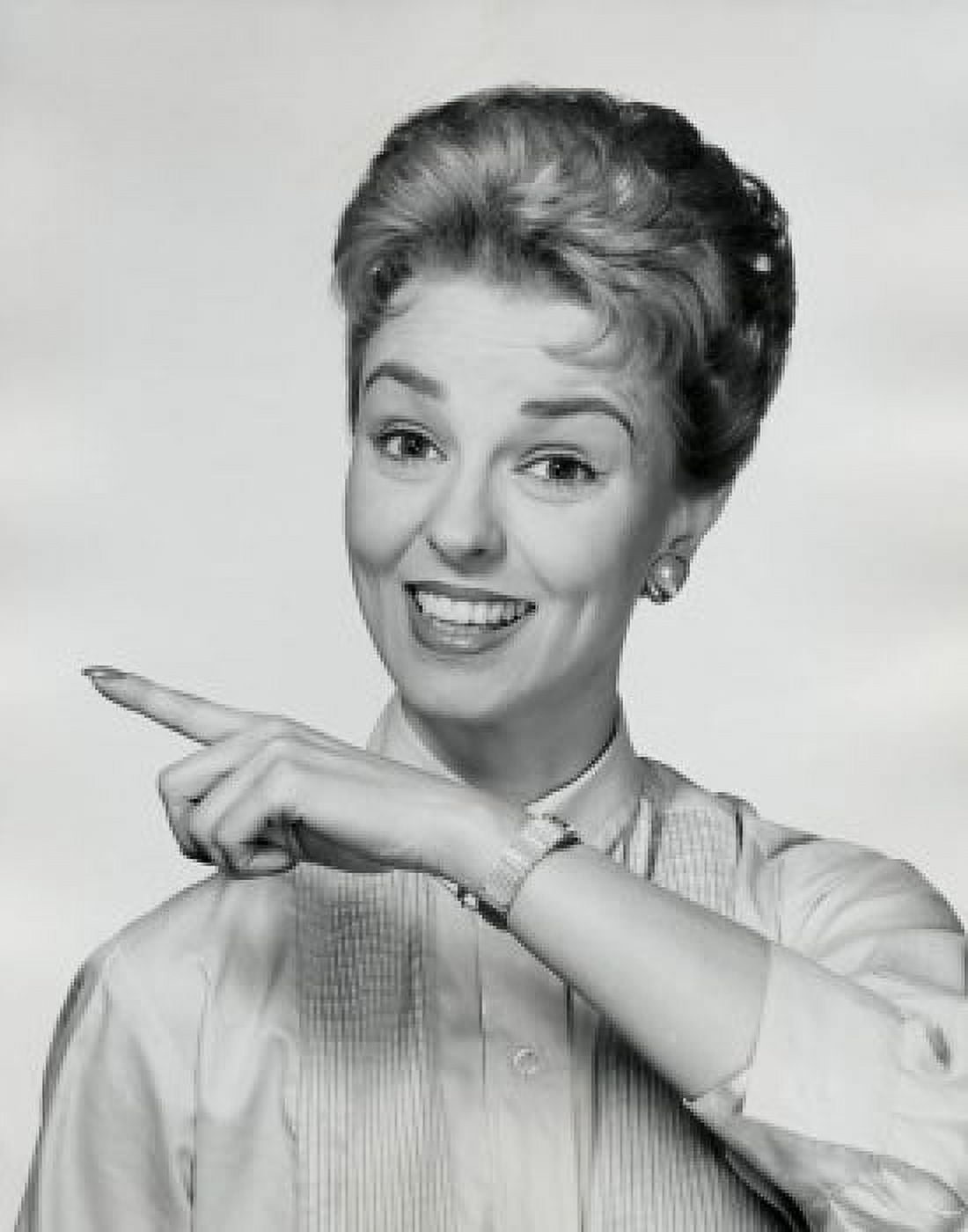 Portrait of a mid adult woman smiling pointing her finger Canvas Art - (24 x 36)