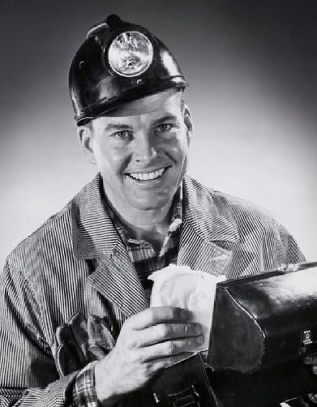 Portrait of a miner holding a lunch box and smiling Canvas Art - (18 x 24)