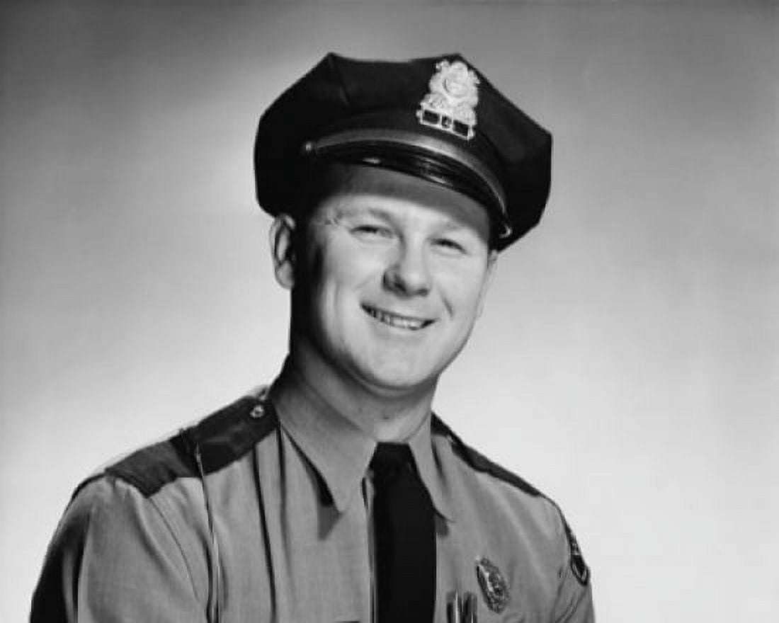 Portrait of a policeman smiling Canvas Art - (24 x 36)