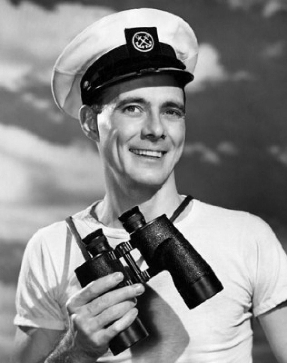 Portrait of a sailor holding a pair of binoculars and smiling Canvas Art - (18 x 24)