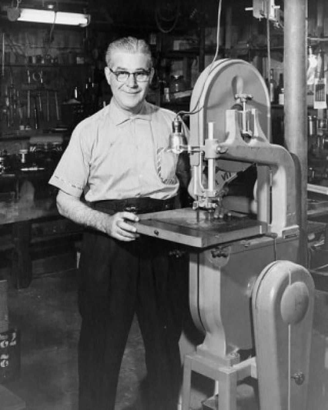 Portrait of a senior man standing near a machine in a workshop Canvas Art - (24 x 36)
