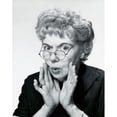 thumbnail image 1 of Portrait of a senior woman puckering her lips Poster Print (24 x 36), 1 of 4