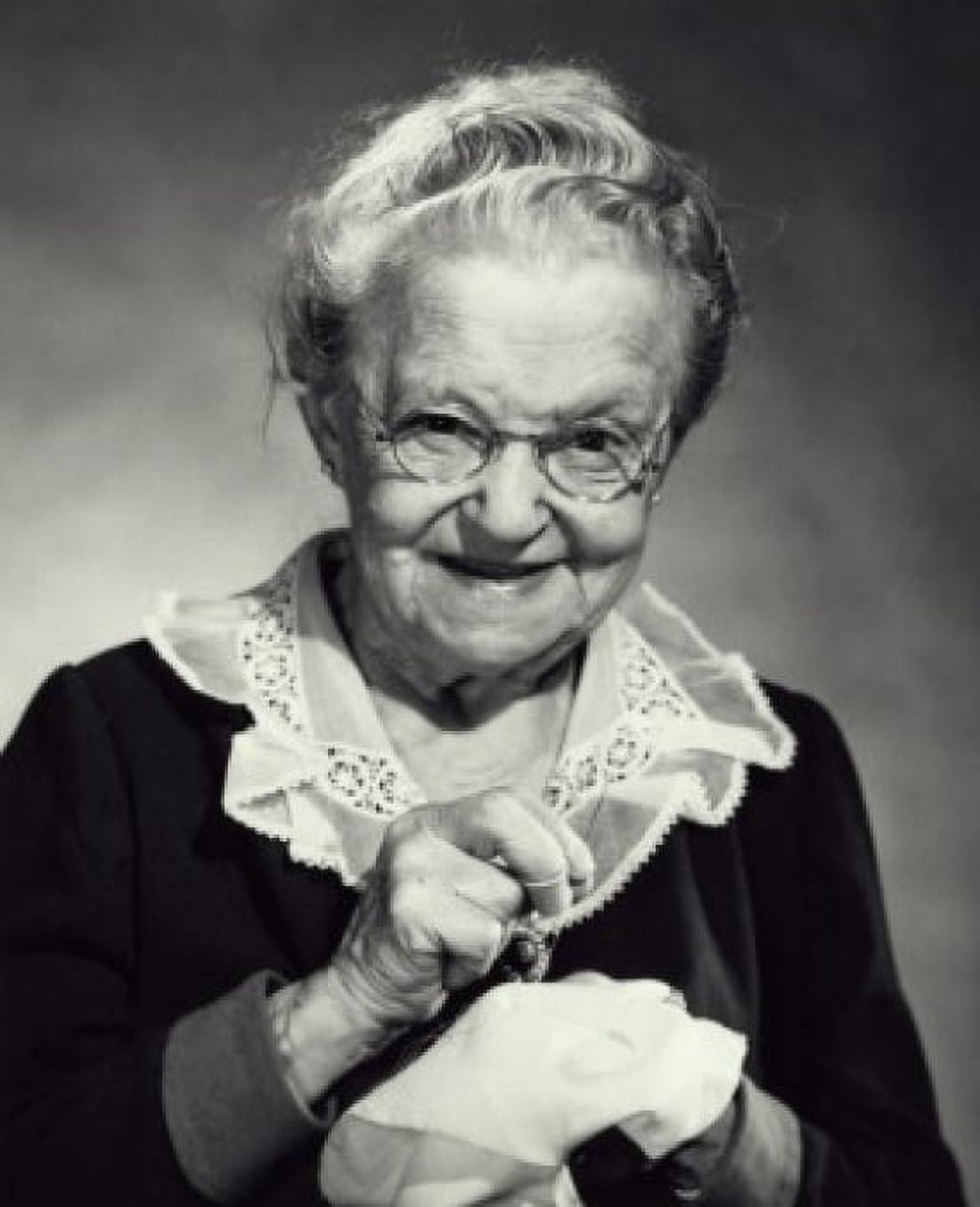 Portrait of a senior woman sewing Canvas Art - (18 x 24)