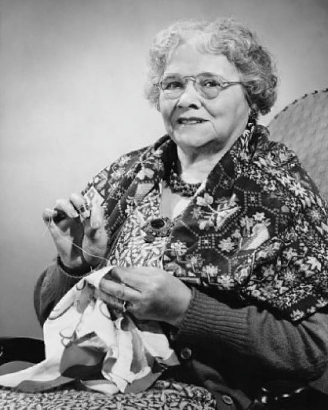 Portrait of a senior woman sewing Canvas Art - (24 x 36)