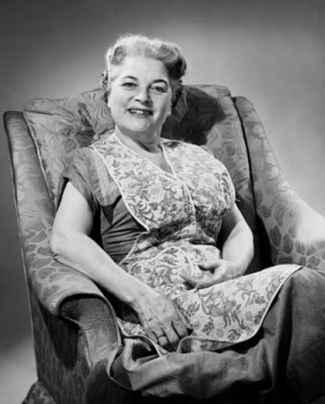 Portrait of a senior woman sitting on an armchair Canvas Art - (18 x 24)