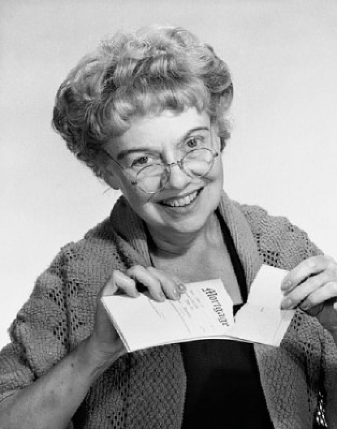Portrait of a senior woman tearing a mortgage document Canvas Art - (18 x 24)