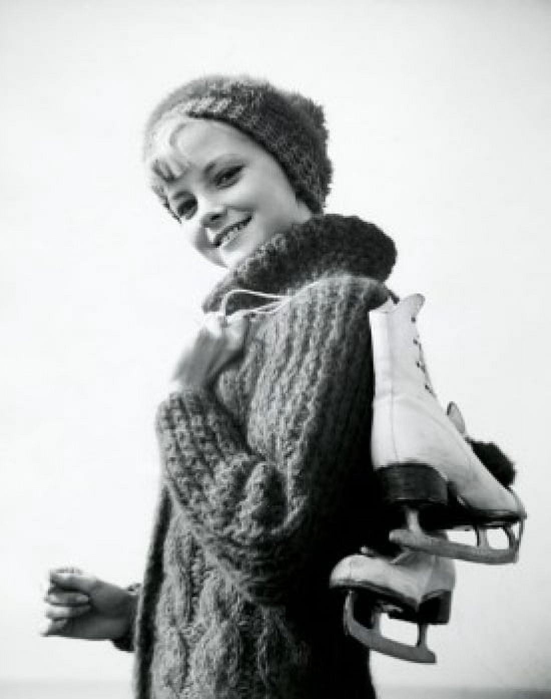 Portrait of a teenage girl carrying a pair of ice skates Canvas Art - (18 x 24)