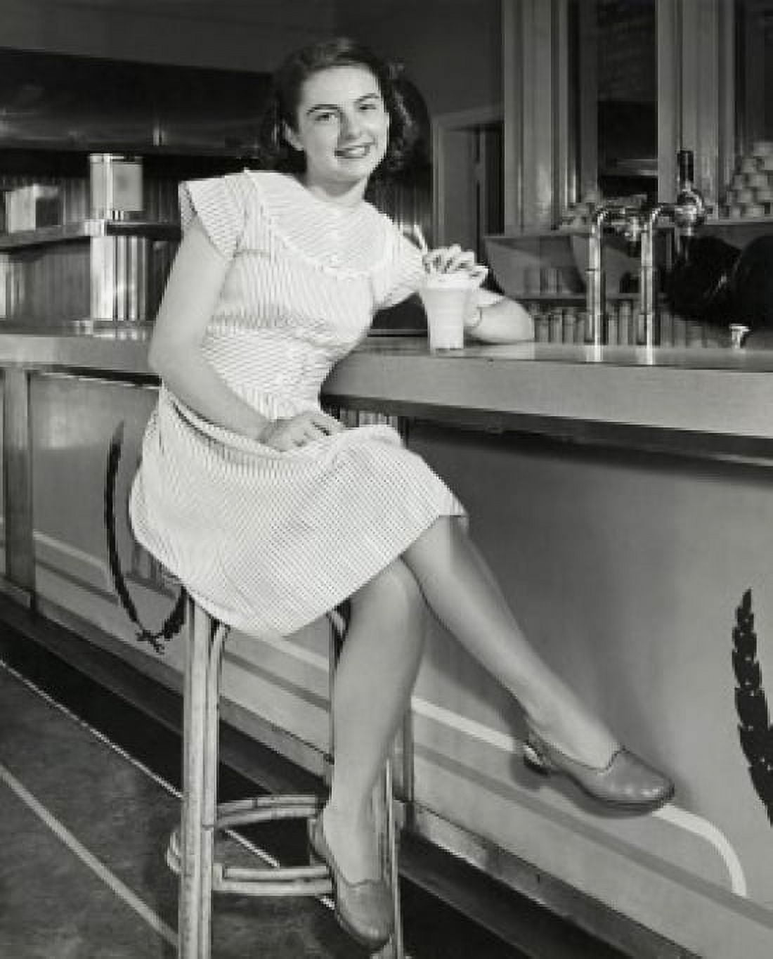 Portrait of a teenage girl sitting in a cafe and smiling 1947 Canvas Art - (24 x 36)