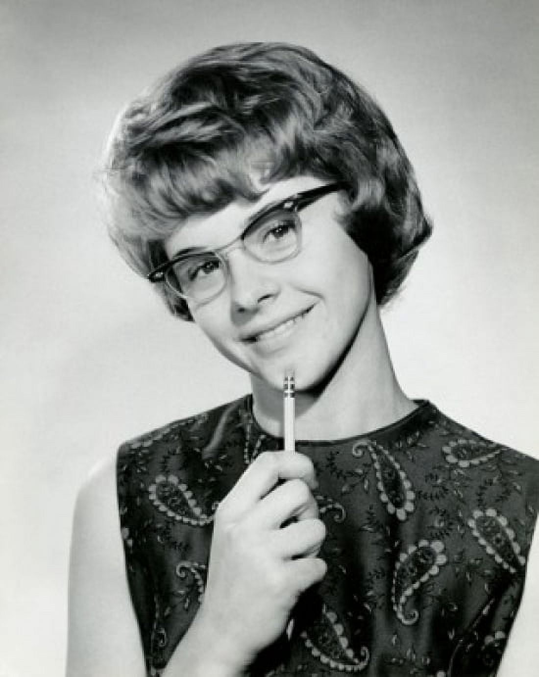 Portrait of a teenage girl smiling and holding a pencil Canvas Art - (18 x 24)
