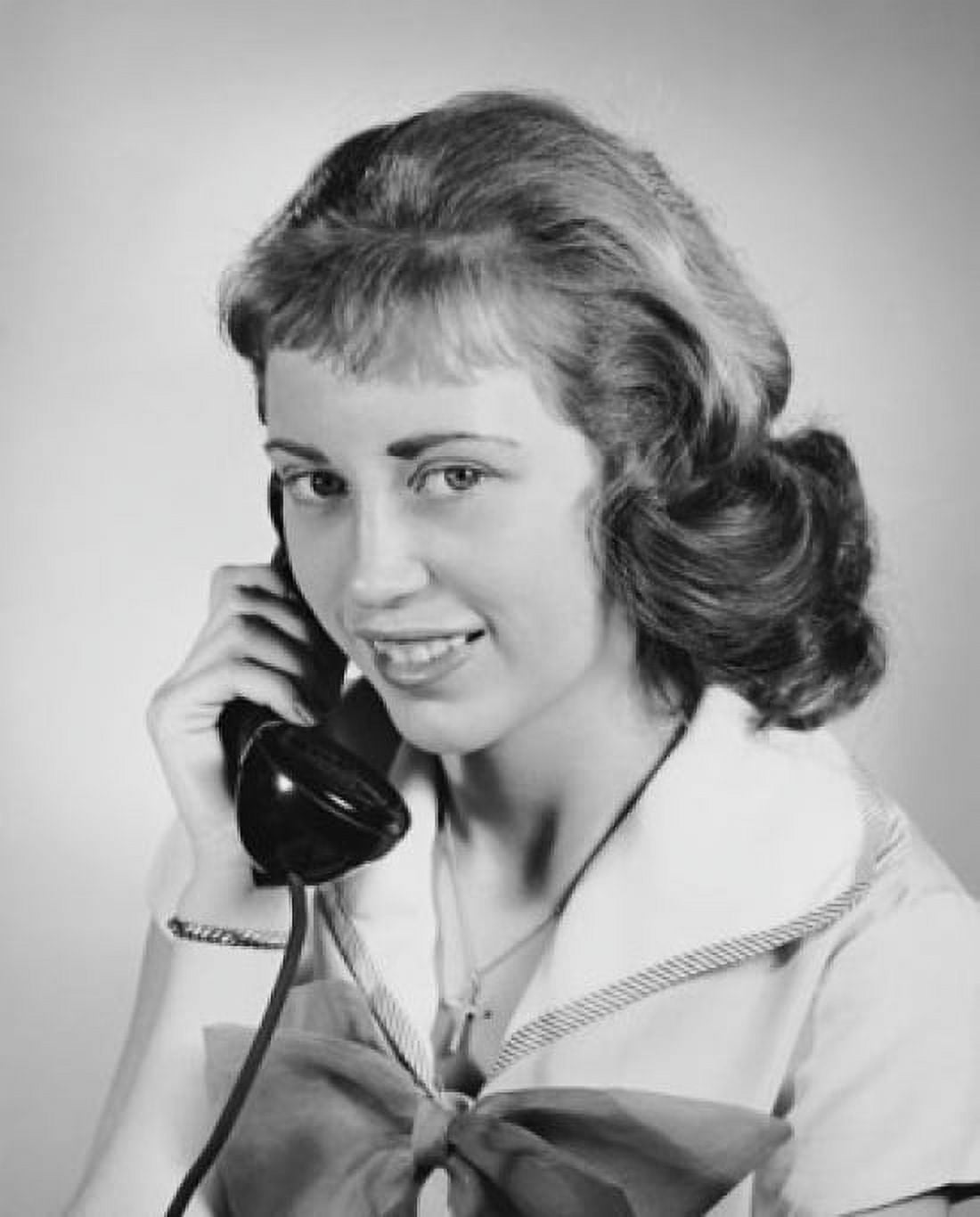 Portrait of a teenage girl talking on the telephone Canvas Art - (18 x 24)