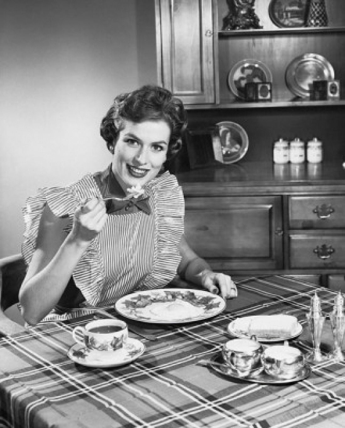 Portrait of a woman having breakfast Canvas Art - (18 x 24)