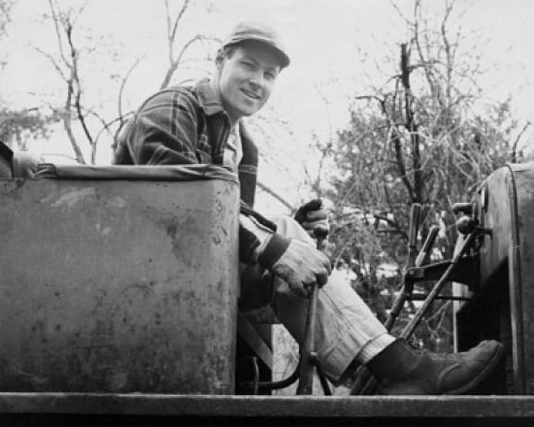 Portrait of a worker sitting in a piece of construction equipment Canvas Art - (18 x 24)