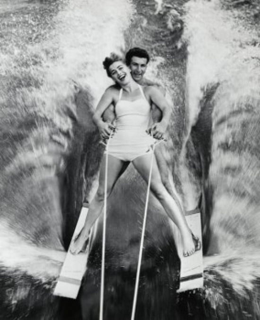 Portrait of a young couple waterskiing Canvas Art - (24 x 36)
