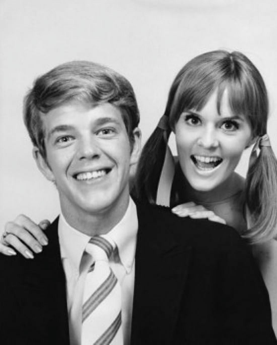 Portrait of a young man and a teenage girl smiling Canvas Art - (18 x 24)