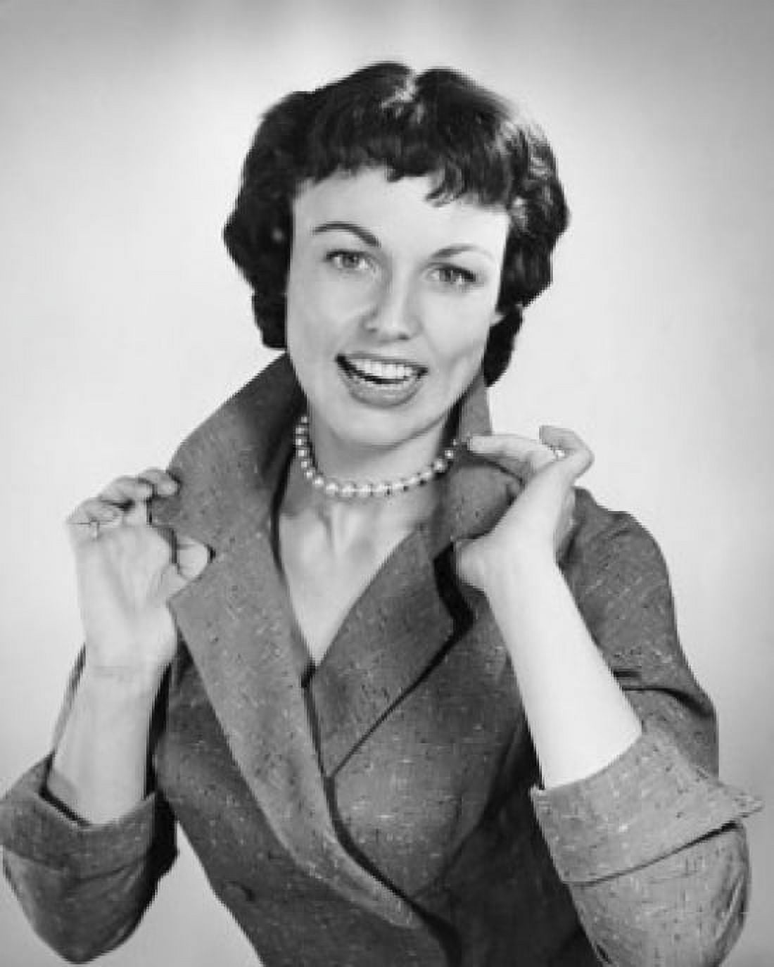 Portrait of a young woman adjusting her collar Canvas Art - (18 x 24)