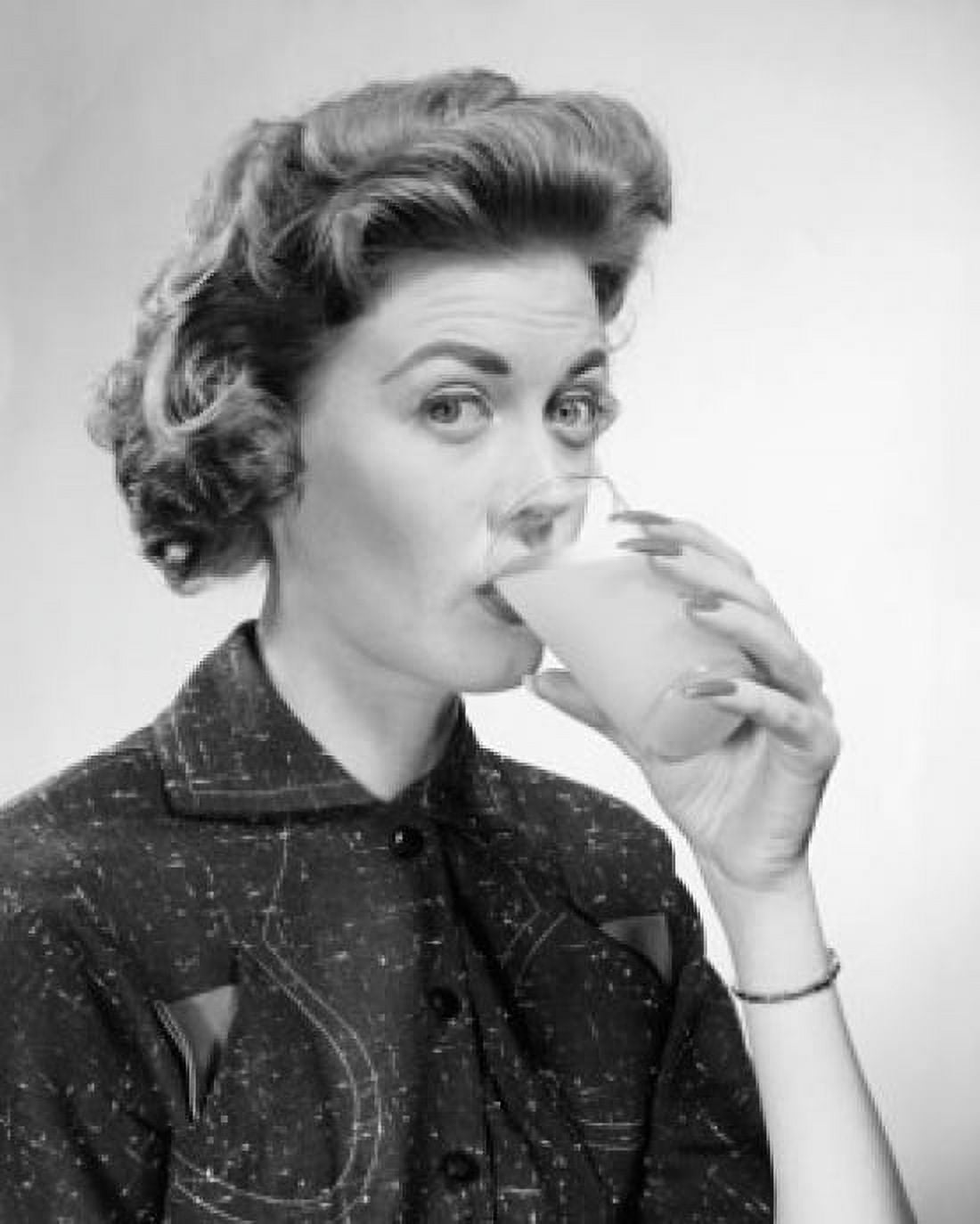 Portrait of a young woman drinking juice Canvas Art - (24 x 36)