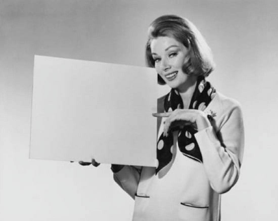 Portrait of a young woman holding a blank placard Canvas Art - (18 x 24)