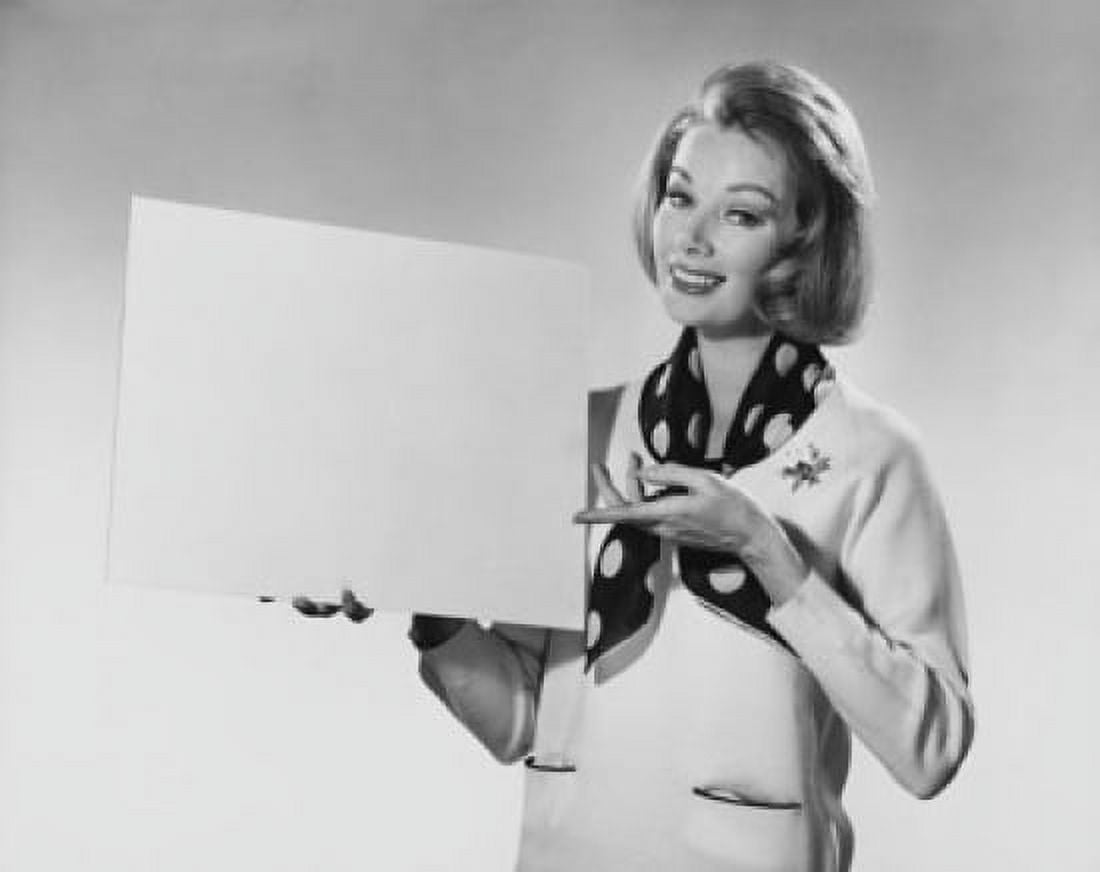 Portrait of a young woman holding a blank placard Canvas Art - (24 x 36)