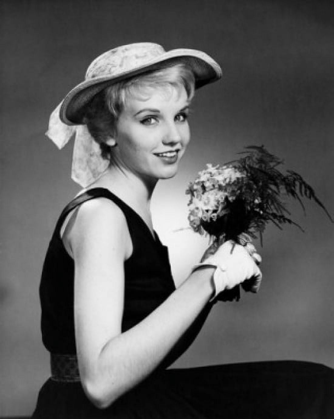 Portrait of a young woman holding a bouquet Canvas Art - (24 x 36)
