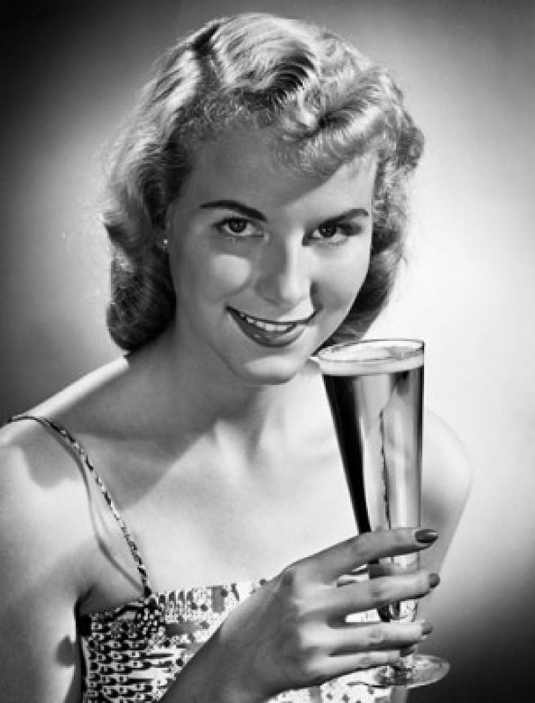 Portrait of a young woman holding a glass of beer Canvas Art - (18 x 24)