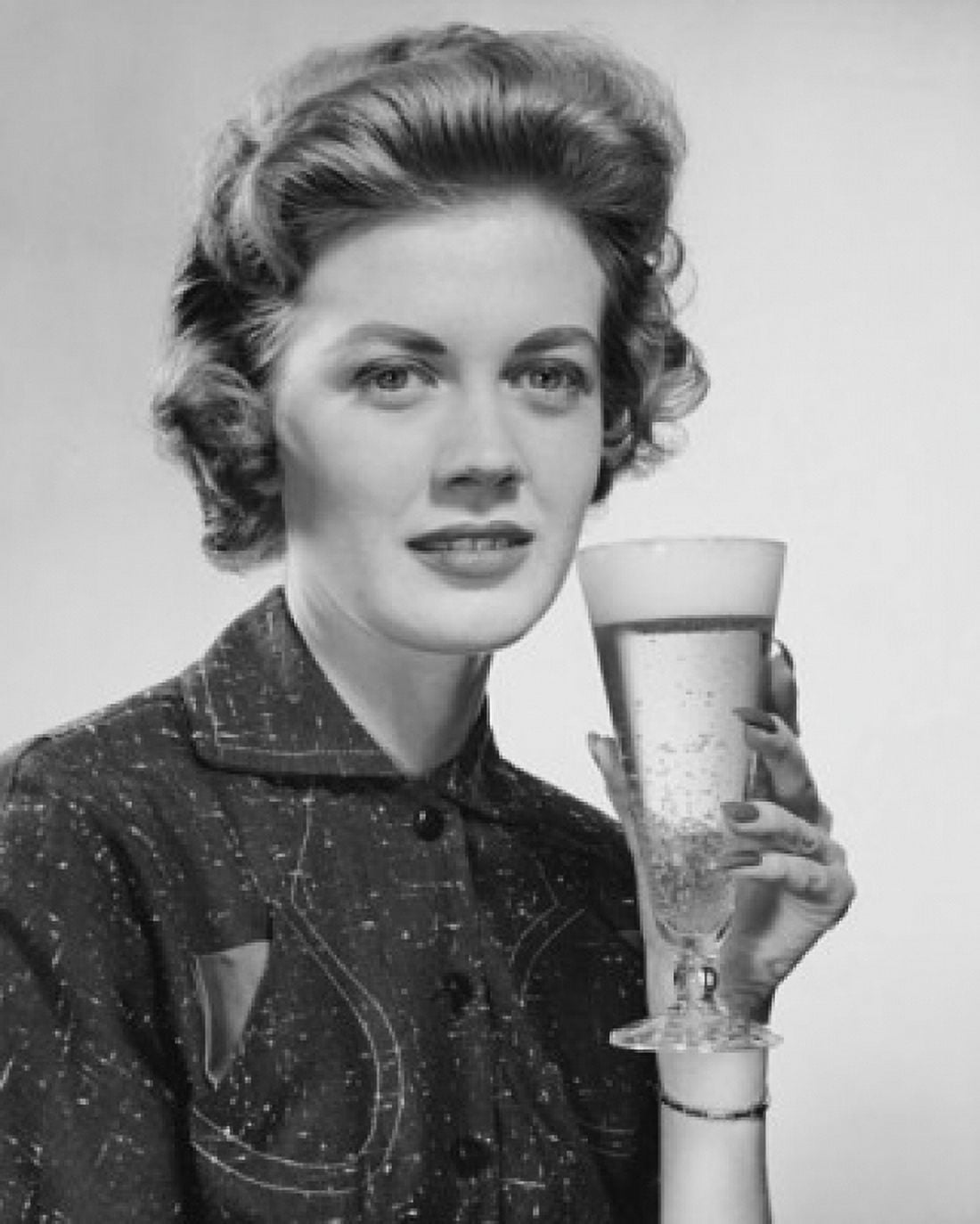 Portrait of a young woman holding a glass of beer Canvas Art - (24 x 36)