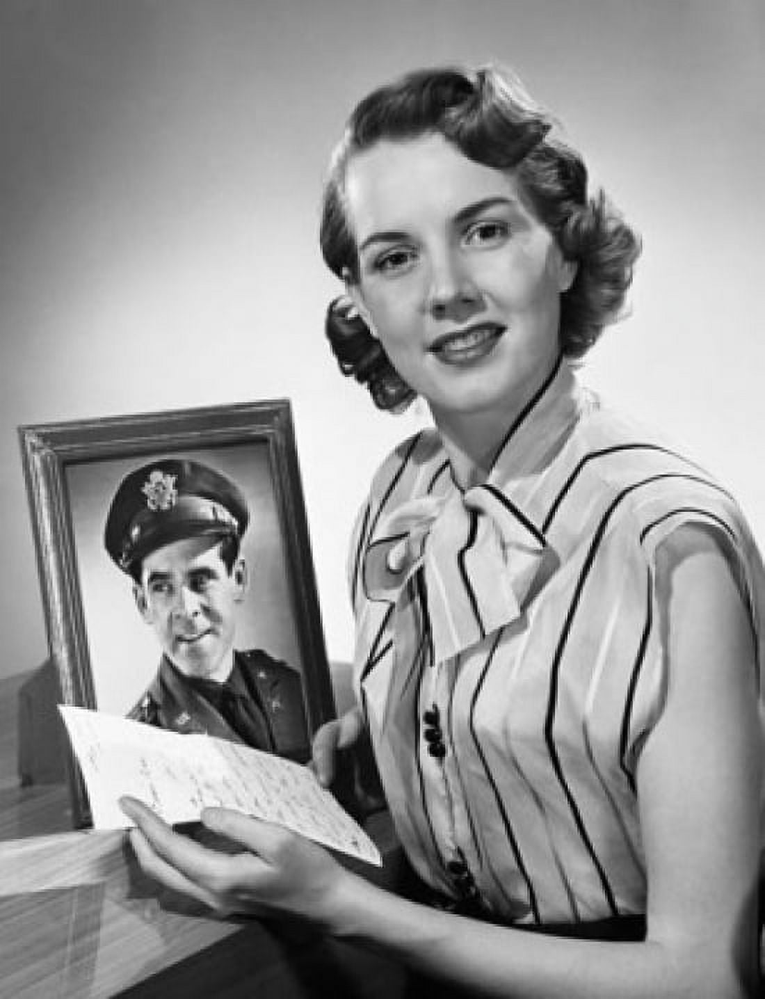 Portrait of a young woman holding a letter Canvas Art - (18 x 24)