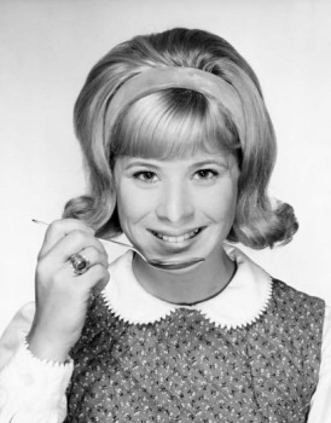 Portrait of a young woman holding a spoon and smiling Canvas Art - (18 x 24)