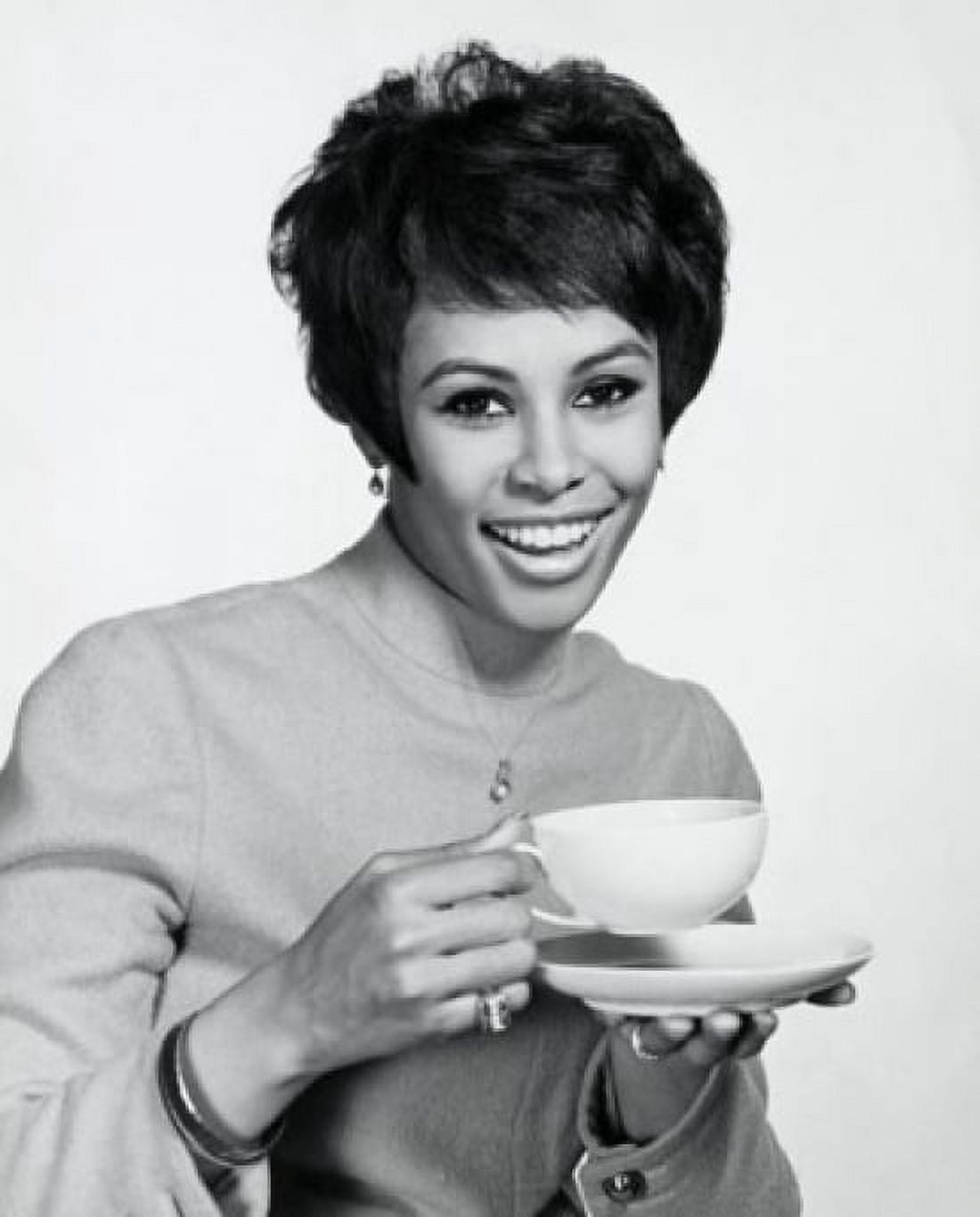 Portrait of a young woman holding a tea cup Canvas Art - (18 x 24)
