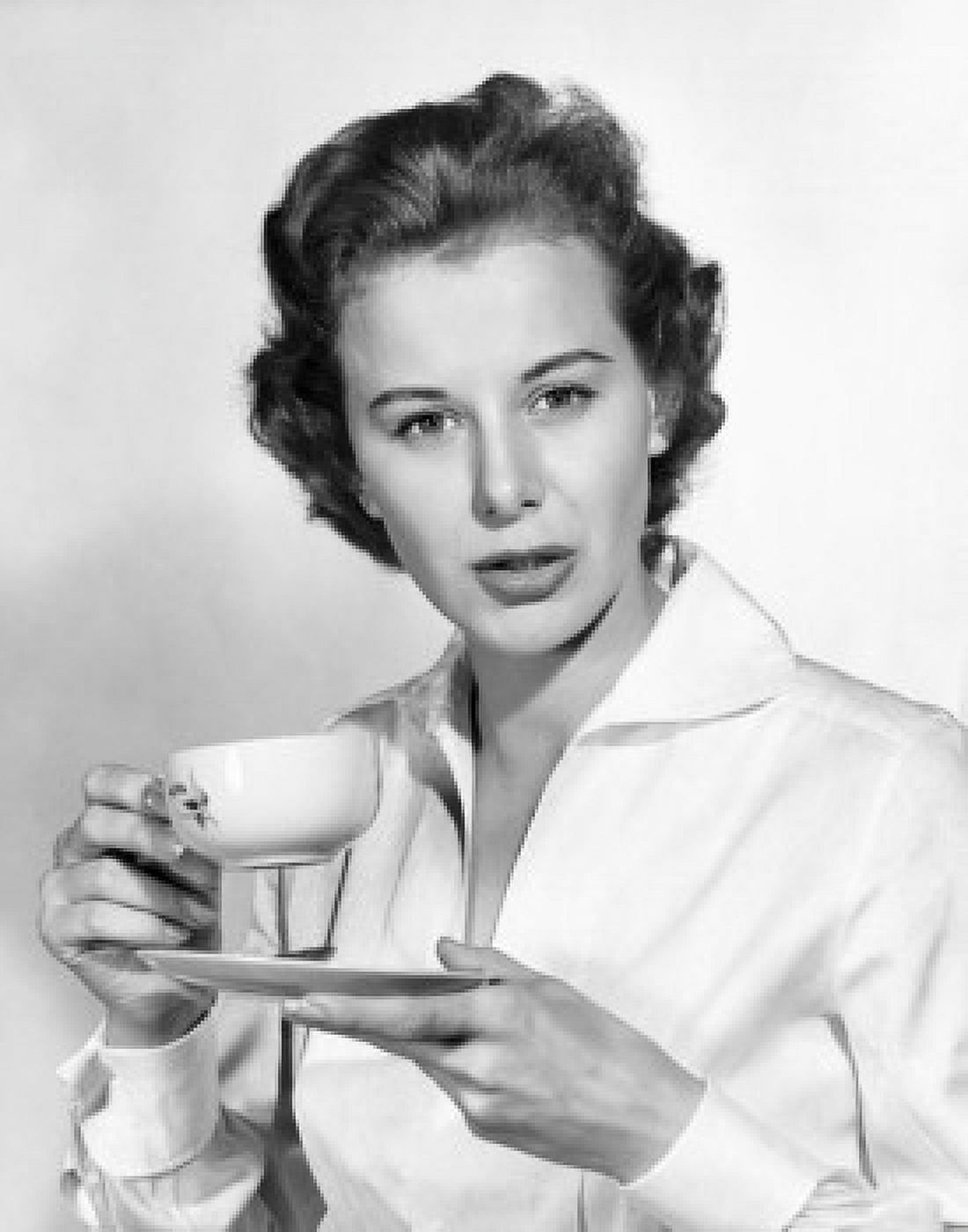Portrait of a young woman holding a tea cup Canvas Art - (18 x 24)