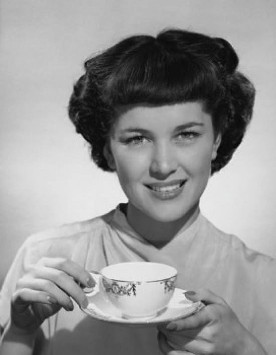 Portrait of a young woman holding a tea cup Canvas Art - (18 x 24)