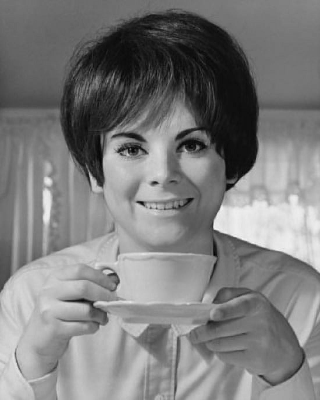 Portrait of a young woman holding a tea cup and saucer Canvas Art - (24 x 36)