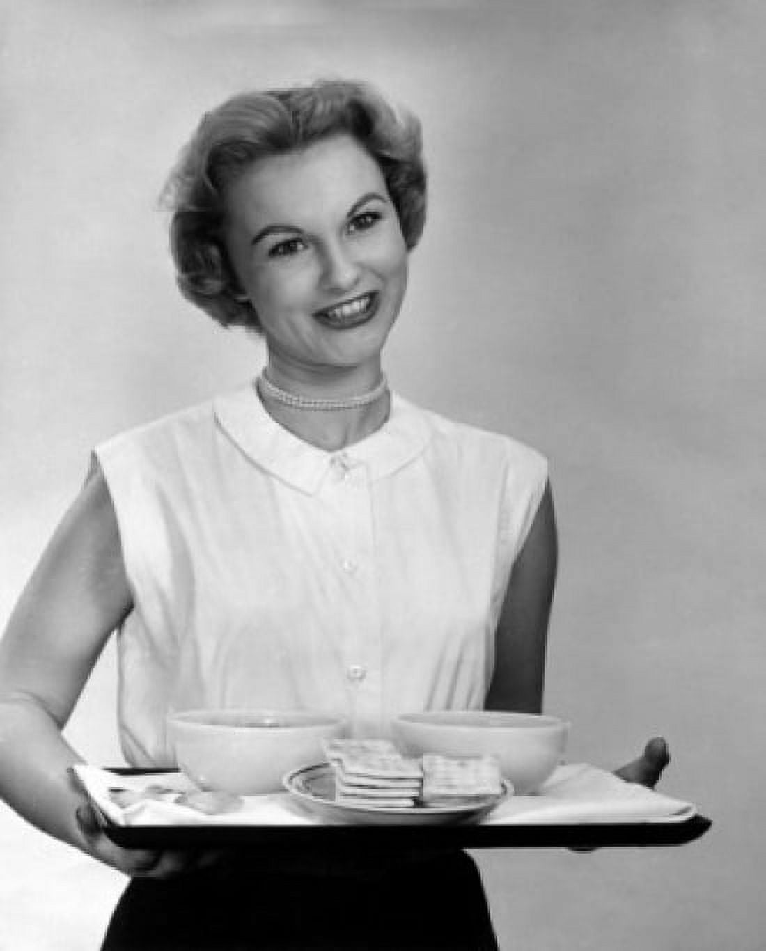 Portrait of a young woman holding a tray Canvas Art - (18 x 24)