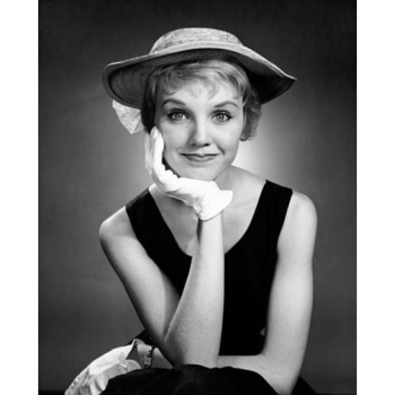 Portrait of a young woman in a hat Poster Print (18 x 24)