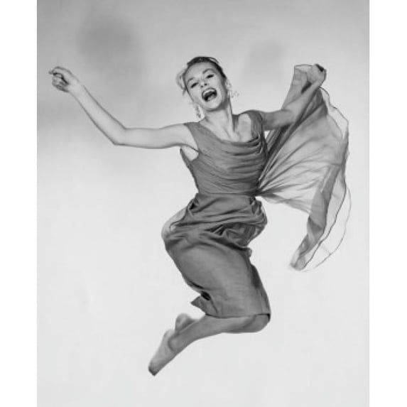 Portrait of a young woman in mid-air Poster Print (24 x 36)
