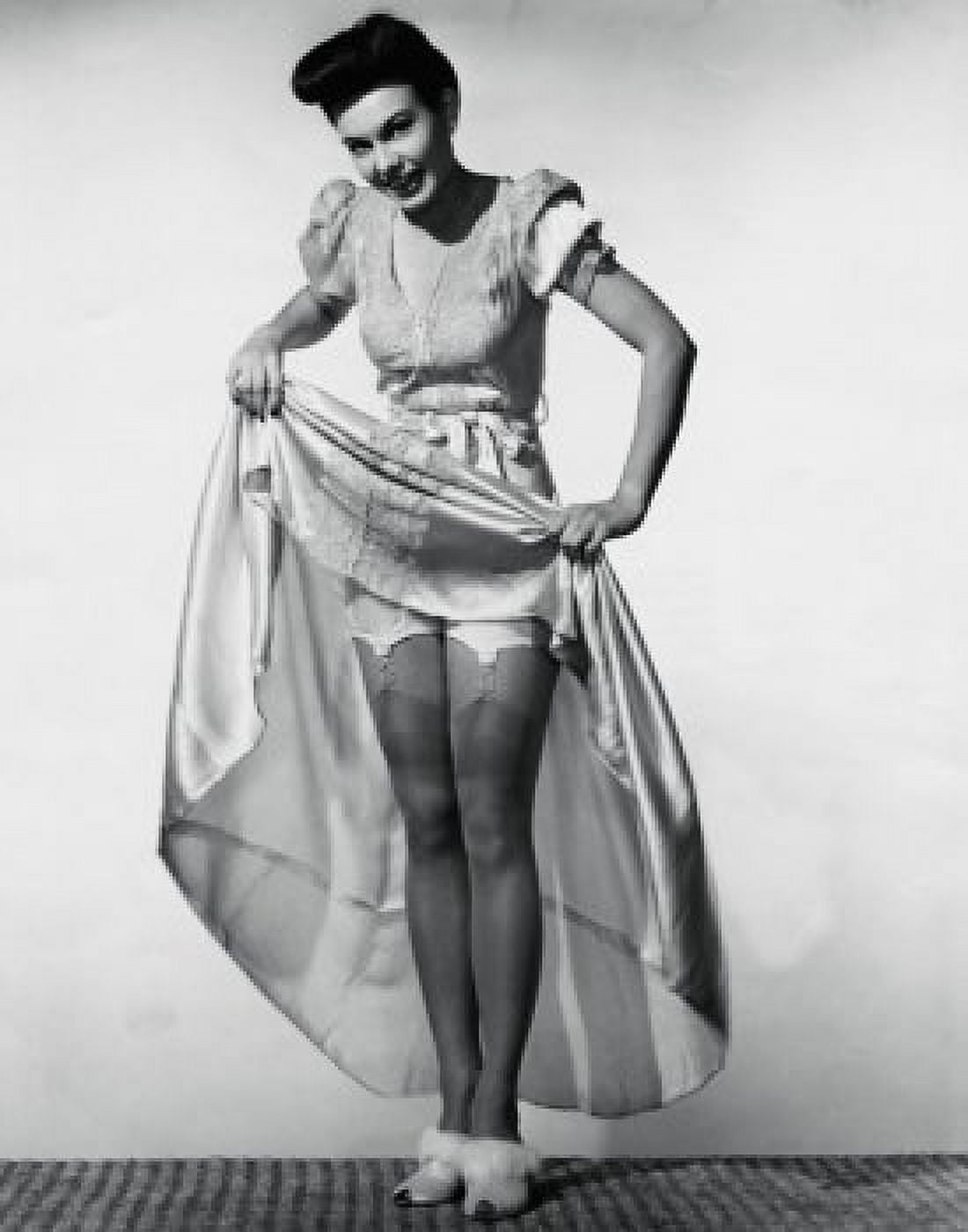 Portrait of a young woman lifting her skirt Canvas Art - (24 x 36)