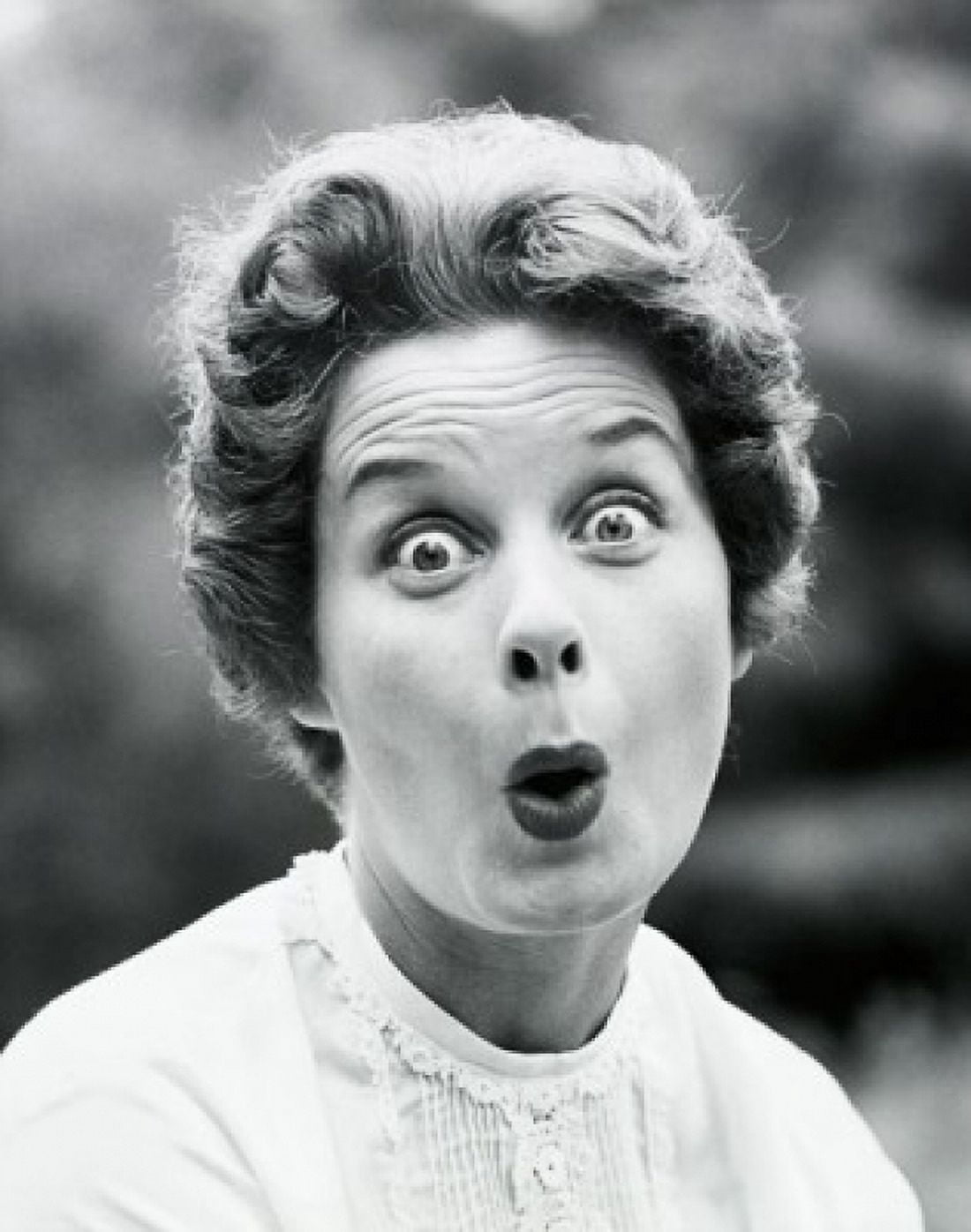 Portrait of a young woman looking surprised Canvas Art - (18 x 24)