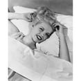 thumbnail image 1 of Portrait of a young woman lying in bed Poster Print (18 x 24), 1 of 4