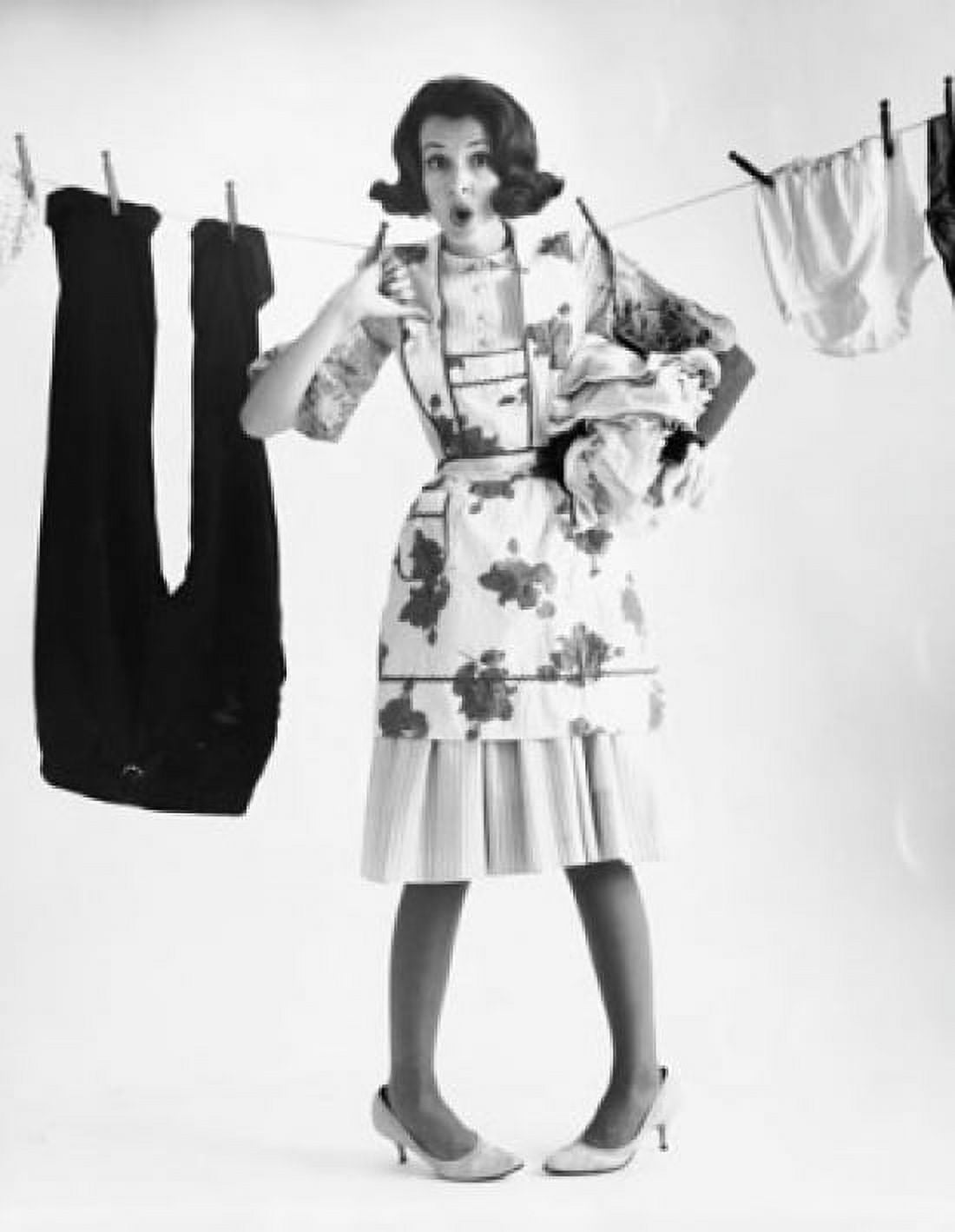 Portrait of a young woman pinned to a clothesline Canvas Art - (24 x 36)